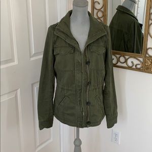 Green army jacket with distressed style
